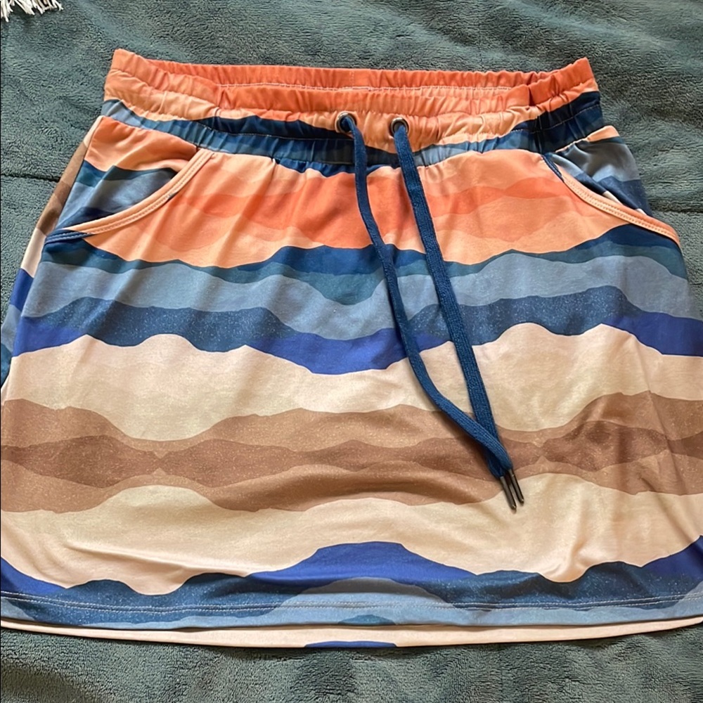 Freedom trail by Kyodan skort with pockets. Gorgeous colors.